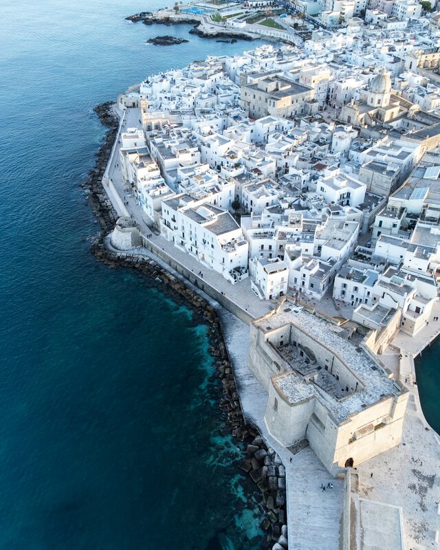 Aerial view of Monopoli's old town and harbour walls on the Adriatic